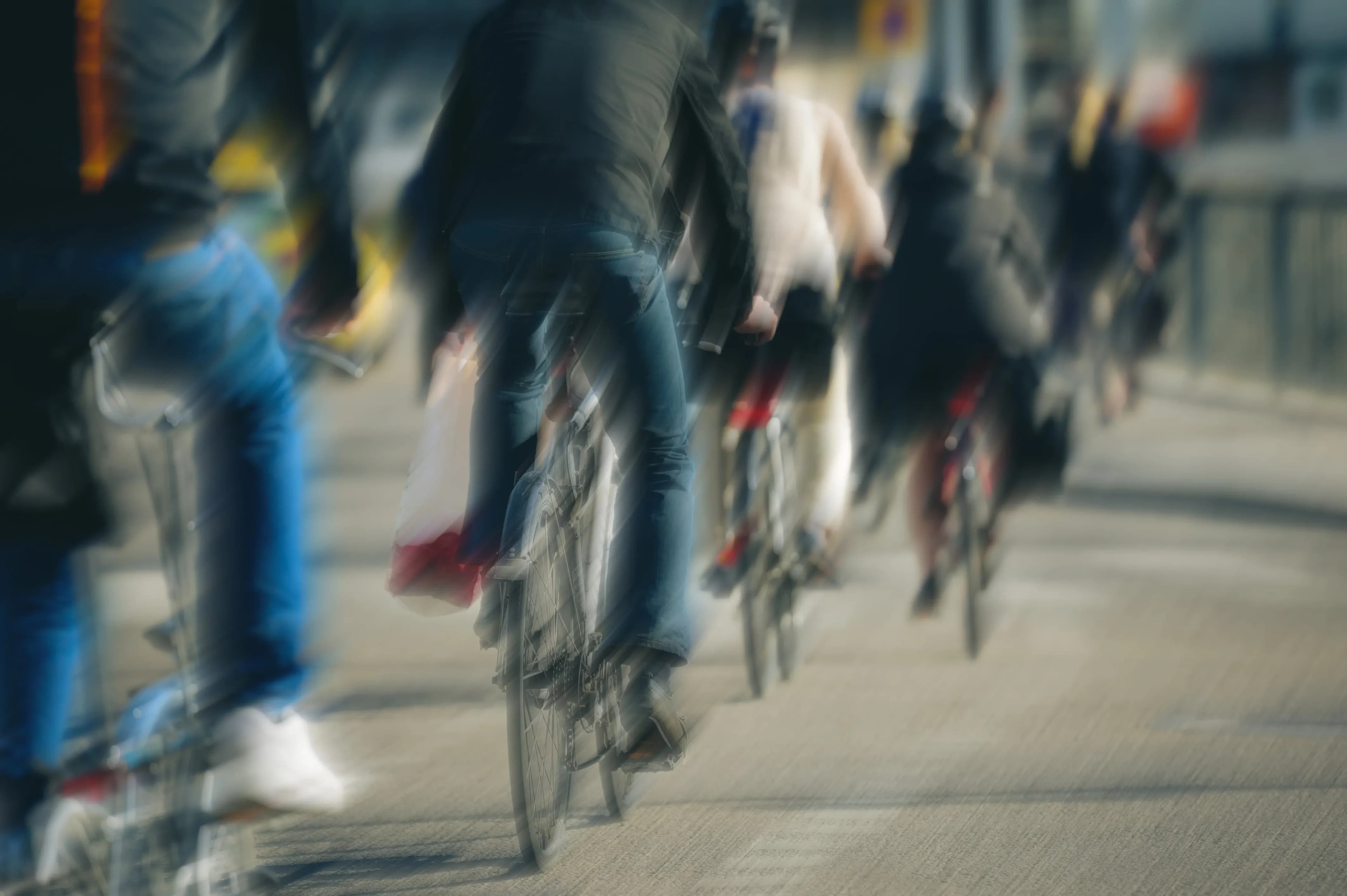 blurry images of bike commuters 